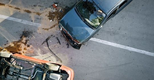 Car accident scene involving an employee who is now considering filing a workers' compensation claim through The Sexton Law Firm.